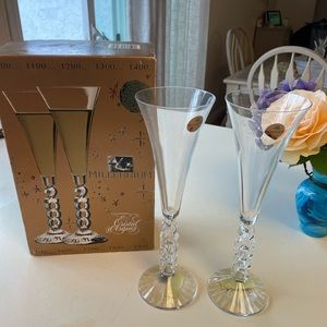 These are never used Millennium Champagne glasses.   2000 is the stem